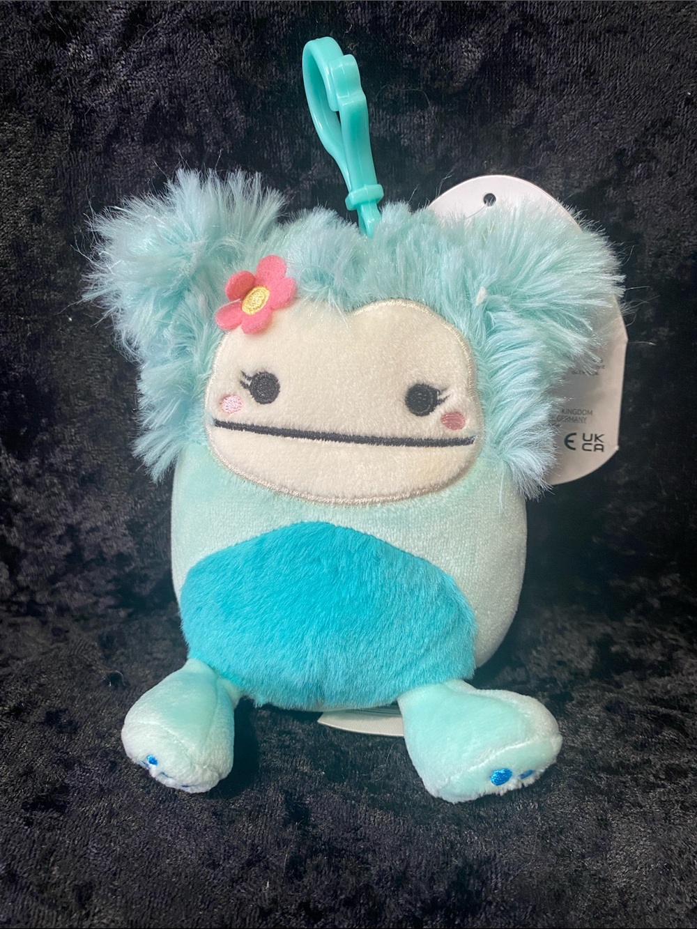 Squishmallows Joelle Aqua Teal Clip-On Plush with Pink Flower Accent